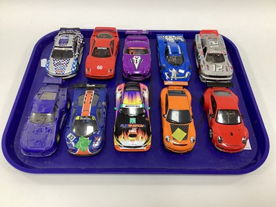 Lot 704 - Ten 1:32 scale slot cars. Mostly with a GT, Le...