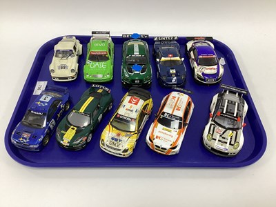 Lot 756 - Ten 1:32 scale slot cars. Mostly with a...