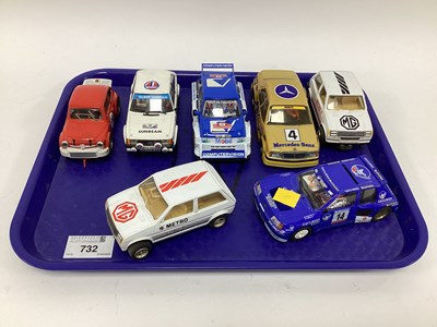 Lot 732 - Seven 1:32 scale slots cars cars. Mostly with...