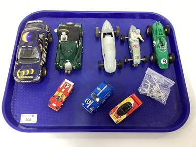 Lot 708 - An collection of eight slot cars in differing...