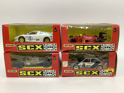 Lot 842 - Four Matchbox SCX 1:32 Scale Slot Cars,...