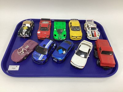 Lot 735 - An assorted collection of ten 1:32 scale slot...