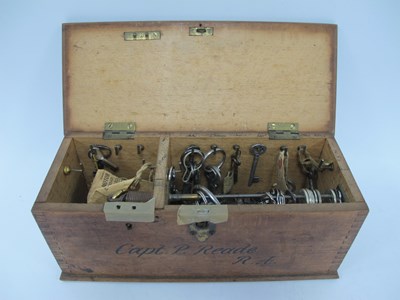 Lot 1321 - An Antique Wooden Key Box, filled with a large...