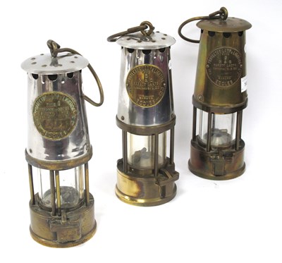 Lot 1418 - Three "Type 6" miners lamps by The Protector...