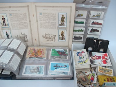 Lot 1377 - Cigarette Cards and Trade Cards, in albums and...