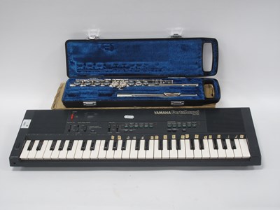Lot 1441 - A Cased Yamaha YFL-22N Student Flute...