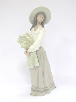 Lot 1182 - A Large Spanish Nao Porcelain Figurine “Lady...