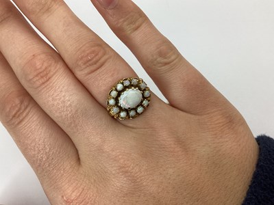 Lot 95 - A 9ct Gold Oval Cluster Ring, claw set...