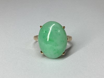 Lot 94 - A Single Stone Oval Cabochon Ring, four claw...