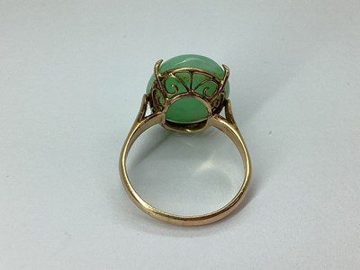 Lot 94 - A Single Stone Oval Cabochon Ring, four claw...