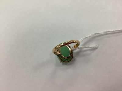 Lot 94 - A Single Stone Oval Cabochon Ring, four claw...
