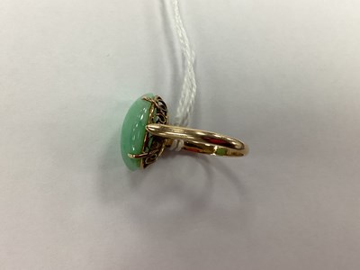 Lot 94 - A Single Stone Oval Cabochon Ring, four claw...
