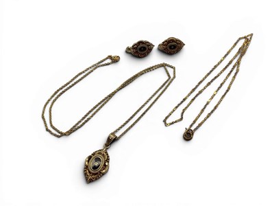 Lot 110 - An Antique Style Enamel Pendant, the black...