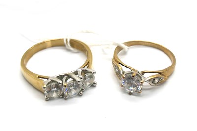 Lot 304 - A Modern 9ct Gold Three Stone Dress Ring, claw...