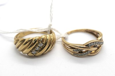 Lot 307 - A Modern Dress Ring, interwoven design with...