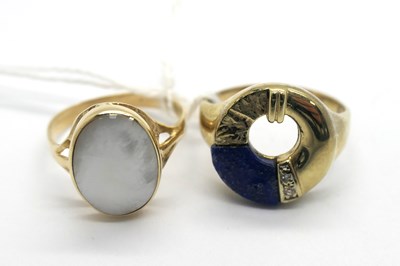 Lot 308 - A Lapis Lazuli Inset Dress Ring, of abstract...