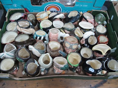 Lot 1102 - Thirty five small Royal Doulton character jugs,...