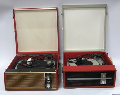 Lot 1440 - Two vintage electrical turntables in red:...