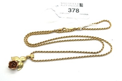 Lot 378 - A Rose Pendant, two colour design, stamped...