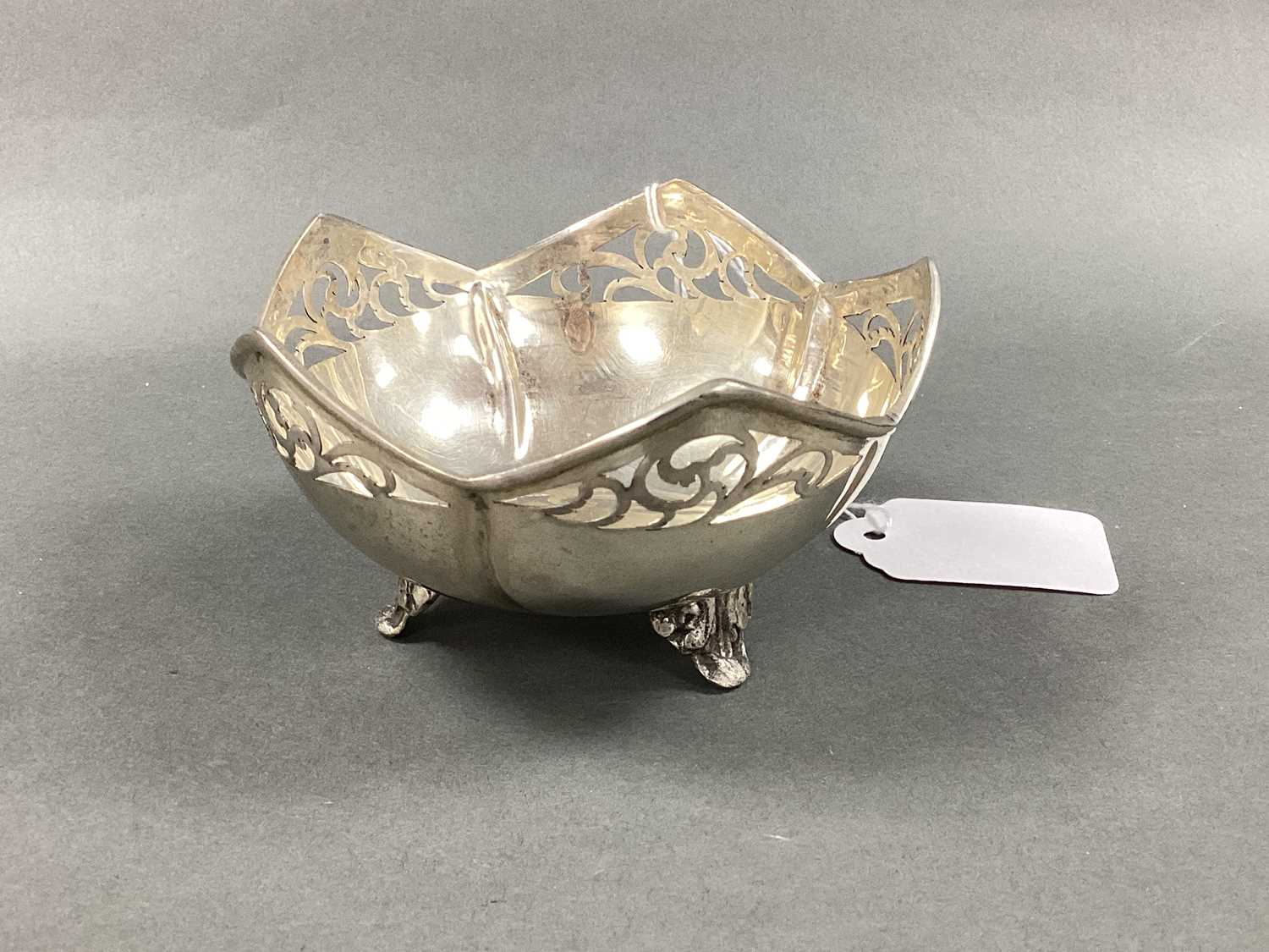 Lot 8 - A Scroll Pierced Dish, with shaped rim, raised...