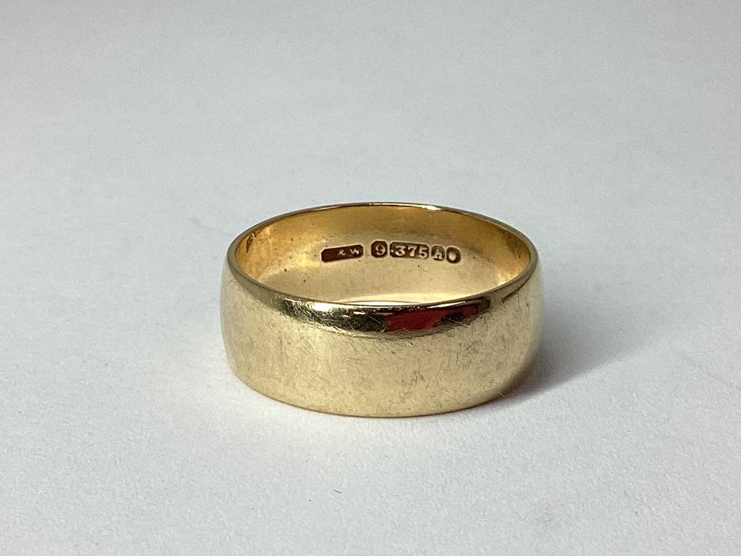 Lot 93 - A 9ct Gold Wide Plain Wedding Band, (finger...