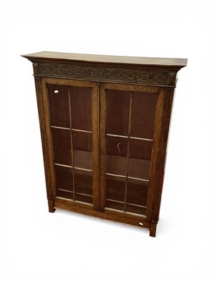 Lot 1552 - Oak Bookcase with blind fretwork top, astragal...