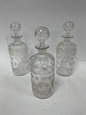 Lot 1245 - Set of Three Glass Decanters Circa XIX Century,...
