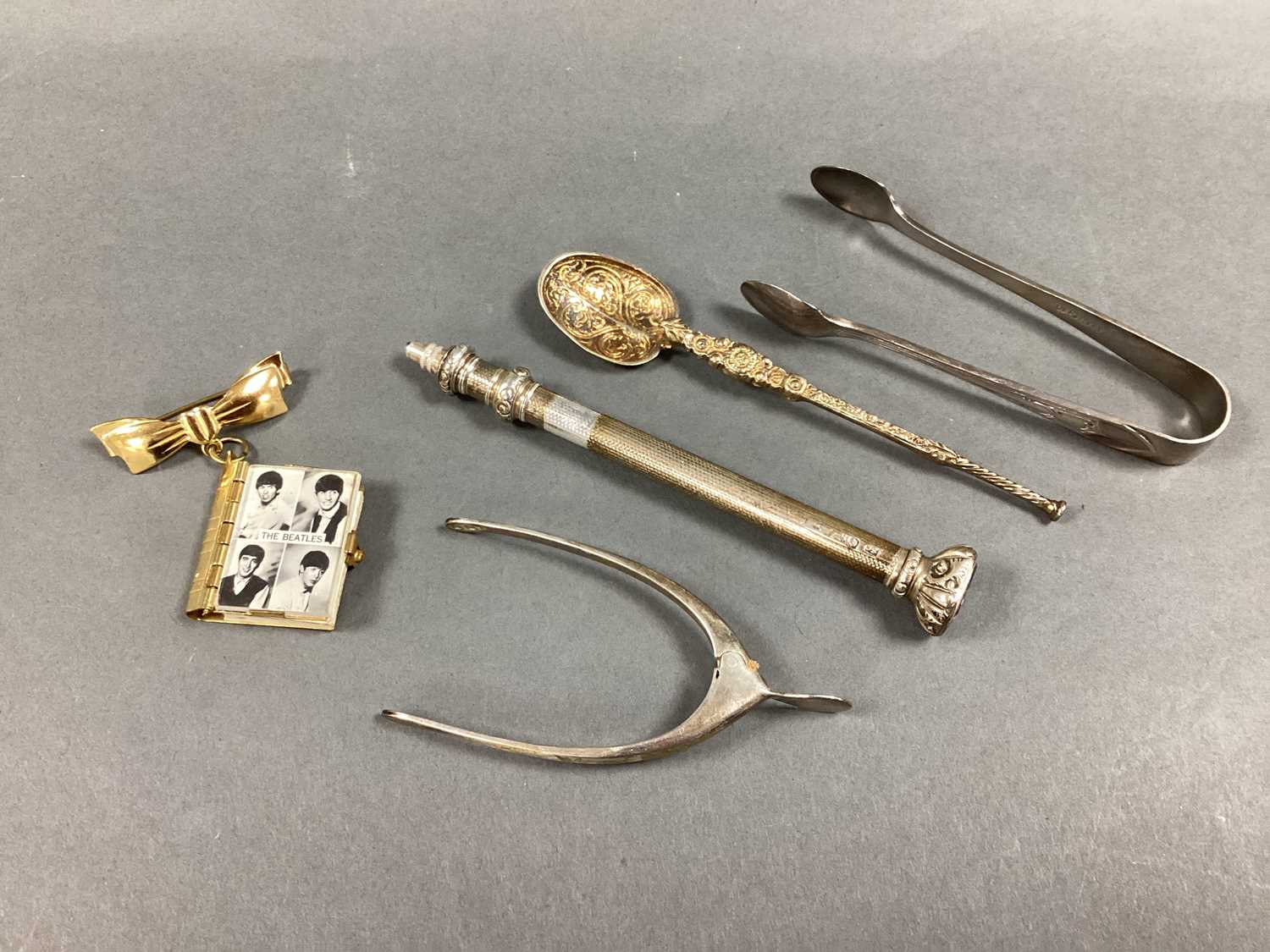 Lot 37 - A Pair of Hallmarked Silver Spur Form Sugar...