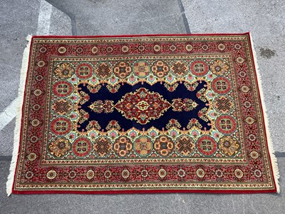 Lot 1563 - Wool Tasseled Persian Rug, with twenty-four...