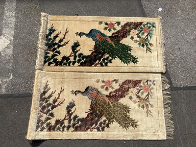 Lot 1554 - Two Wool Tasseled Rugs, each featuring Peacock...
