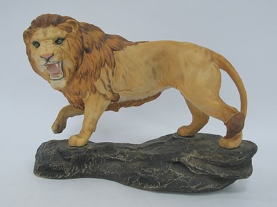 Lot 1242 - A Large Beswick Porcelain Lion Figure on Rock...