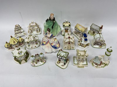 Lot 1213 - Fifteen Coalport fine bone china cottages...