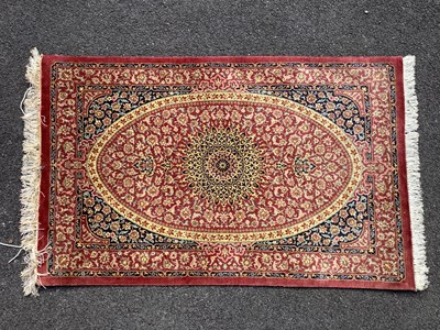 Lot 1632 - Adil Besim of Austria, Silk Tasseled Rug,...