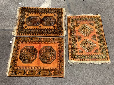 Lot 1610 - Three Wool Tasseled Rugs, each with twin...