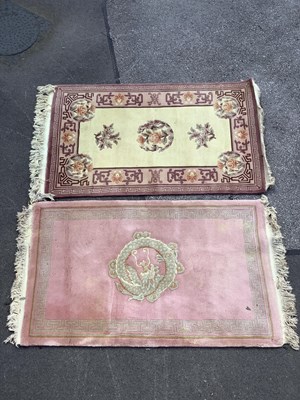 Lot 1534 - Two Chinese Wool Tasseled Rugs, both with...