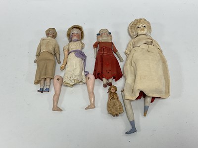 Lot 319 - A collection of six Bisque / Paper Mache...