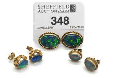 Lot 348 - A Pair of Black Opal Earrings, oval (triplet?)...