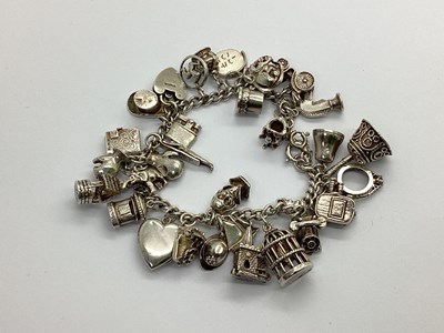 Lot 93 - A Curb Link Bracelet, to clasp stamped...