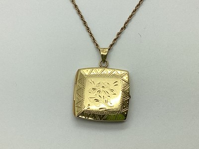 Lot 97 - A Decorative Cushion Shape Locket, with floral...