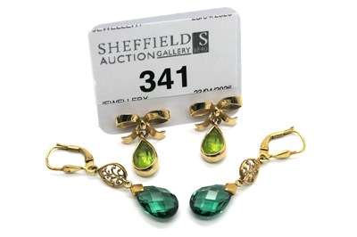 Lot 341 - A Pair of 9ct Gold Peridot and Bow Earrings,...