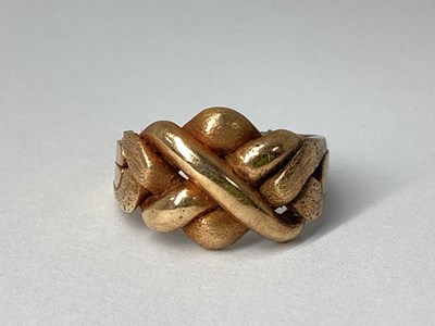 Lot 64 - A Four Piece Puzzle Ring, (damage/loss),...