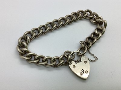 Lot 100 - A Hallmarked Silver Curb Link Bracelet, to...