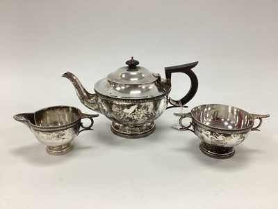 Lot 4 - A Matched Hallmarked Silver Three Piece Tea...