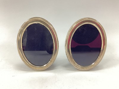 Lot 9 - A Pair of Hallmarked Silver Mounted Oval...