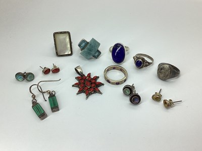 Lot 130 - A Rectangular Shell Panel Dress Ring, within...