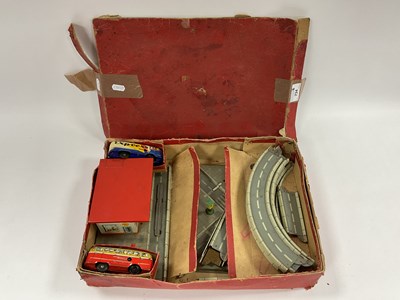 Lot 734 - A Post War Clockwork Tinplate Track by Tippco...