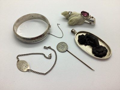 Lot 126 - A Decorative Hinged Bangle, with scroll...