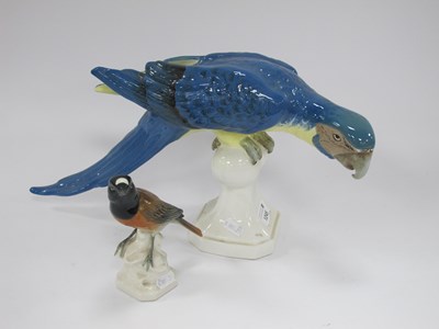 Lot 1245 - Royal Dux Parrot Perched on a Ball, raised...