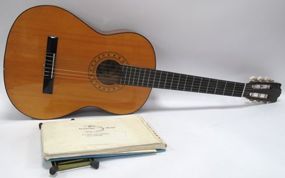 Lot 1329 - A bagged JSH Encore classical guitar (ENC50N),...