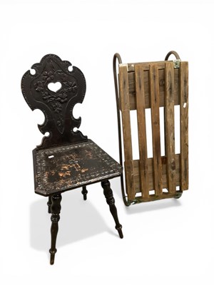 Lot 1605 - Pine Sledge, and a carved hall chair (2).